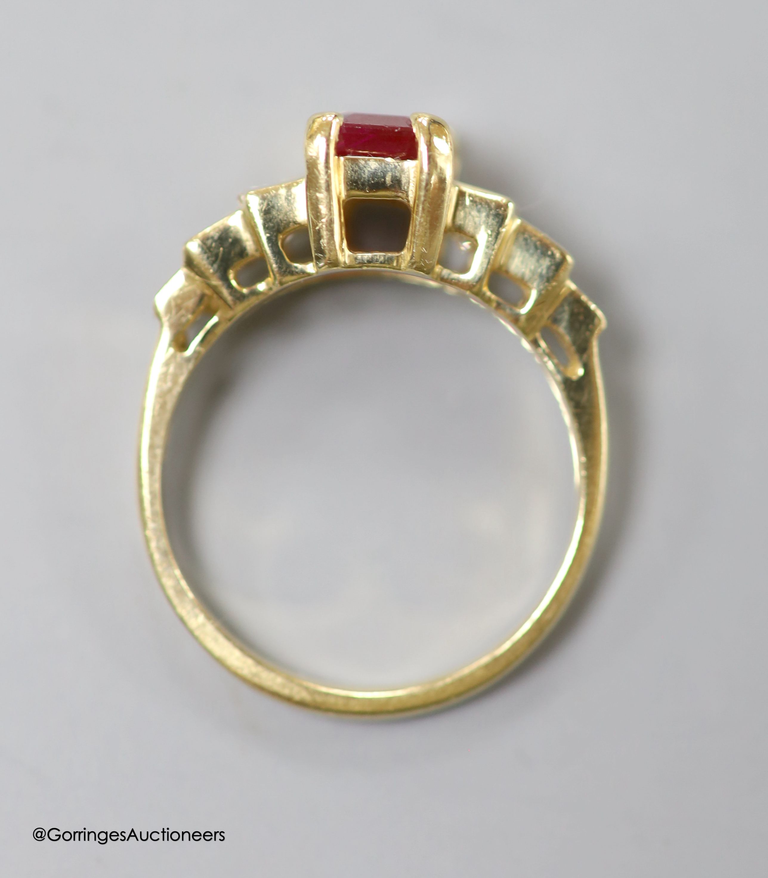 A modern 14k, ruby and graduated ruby and diamond set seven stone half hoop ring, size N, gross 3.6 grams.